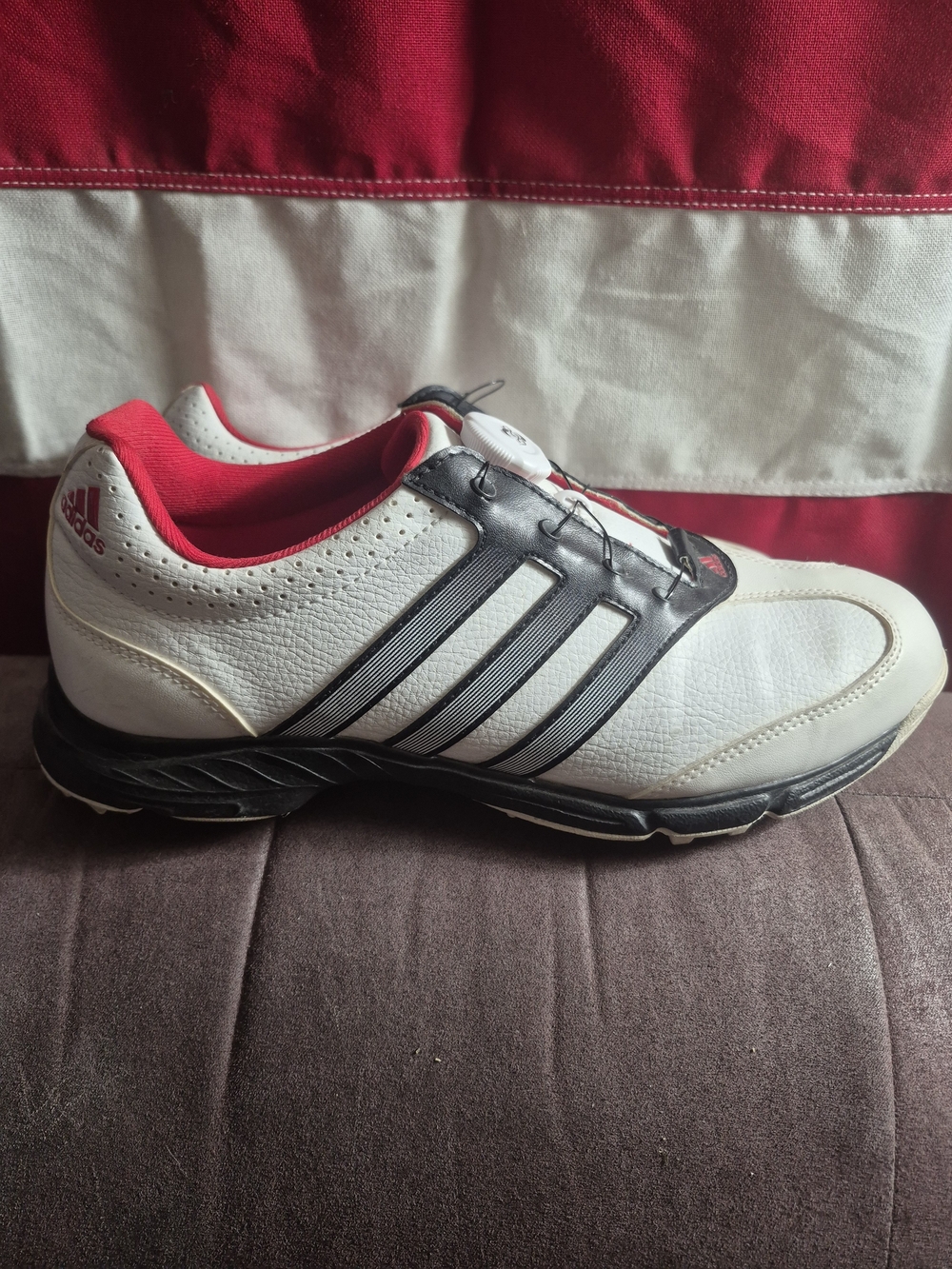 adidas Men’s White Athletic Sneakers with Black Stripes and Red Lining